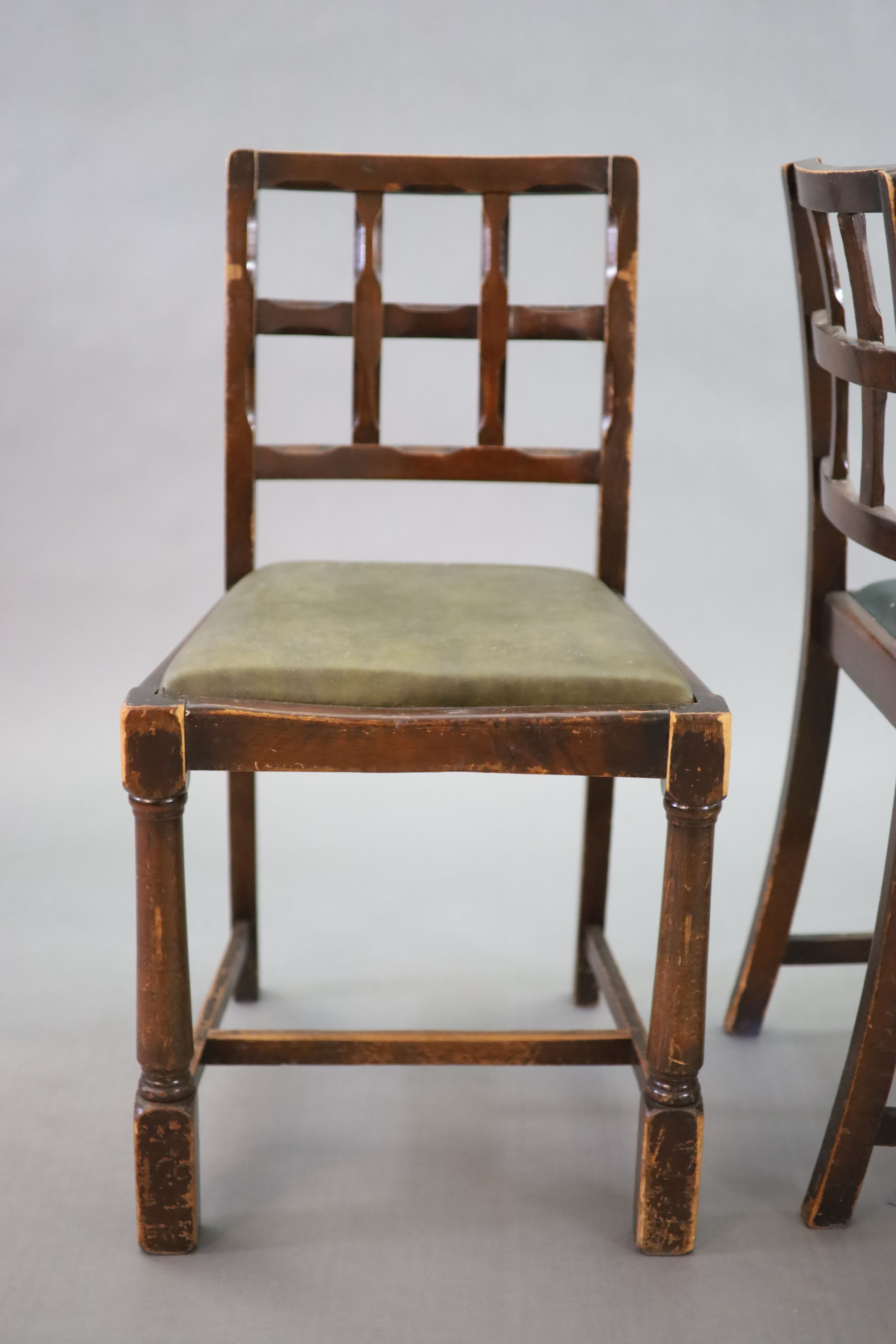 A set of eight early 20th century oak and beech dining chairs